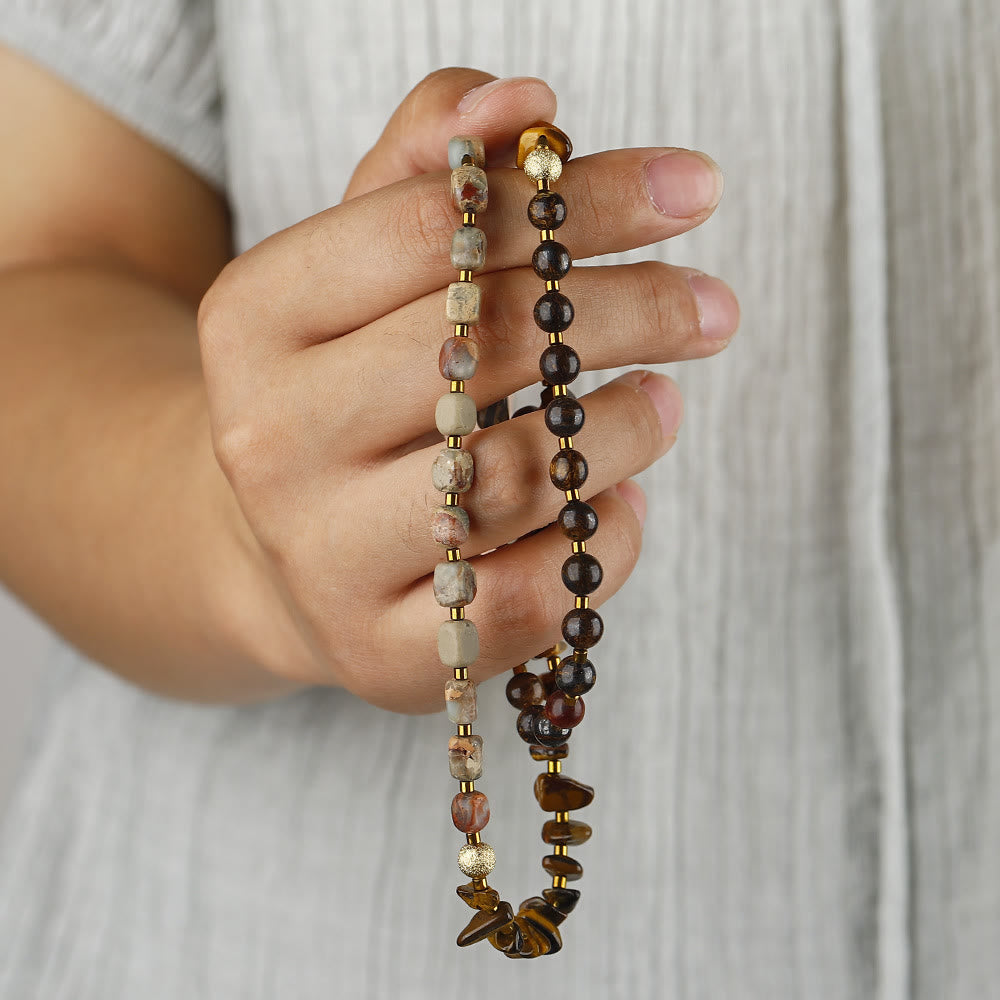 Pulsera de cuentas de ojo de tigre y agalmatolita de Olivenorma