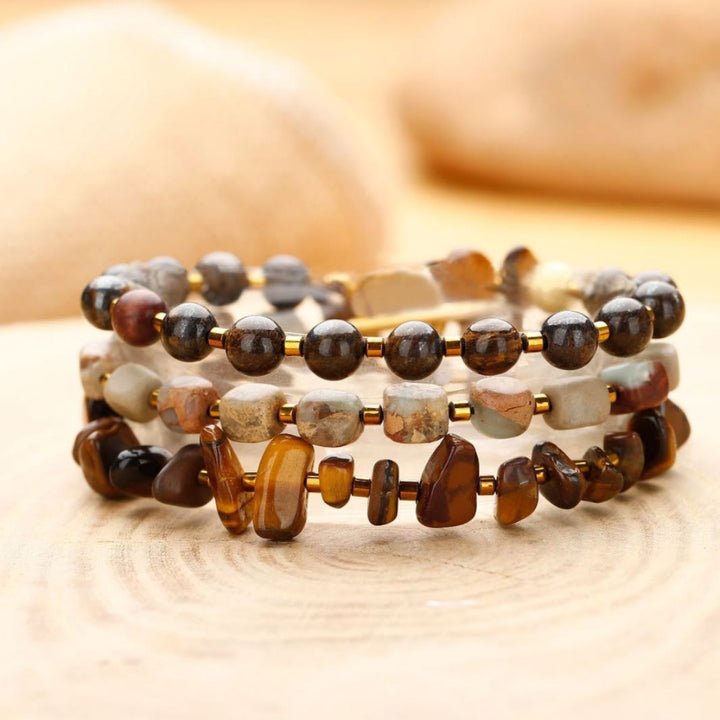 Pulsera de cuentas de ojo de tigre y agalmatolita de Olivenorma
