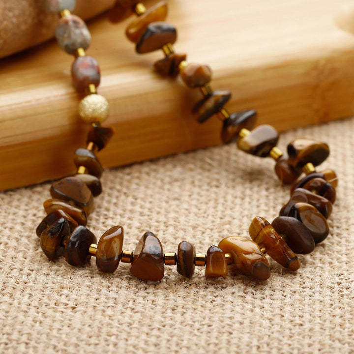Pulsera de cuentas de ojo de tigre y agalmatolita de Olivenorma