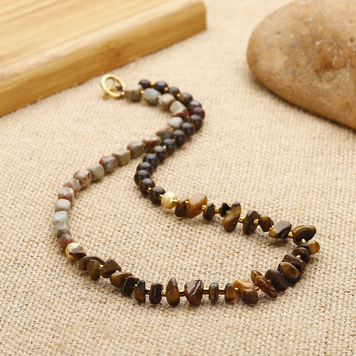 Pulsera de cuentas de ojo de tigre y agalmatolita de Olivenorma