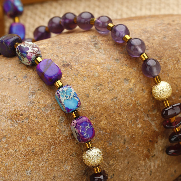 Pulsera de cuentas de piedra emperador violeta, amatista y granate de Olivenorma