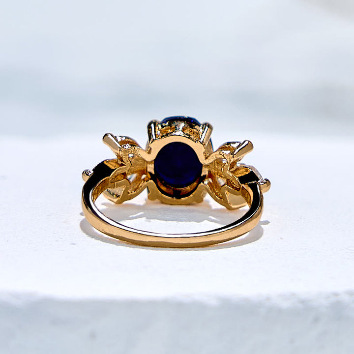 Anillo de hoja de circón de piedra arenisca azul de talla ovalada de Olivenorma