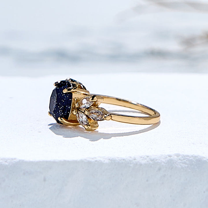 Anillo de hoja de circón de piedra arenisca azul de talla ovalada de Olivenorma