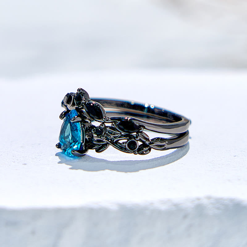 Juego de anillos de compromiso con hoja de aguamarina y piedra de la suerte de Olivenorma