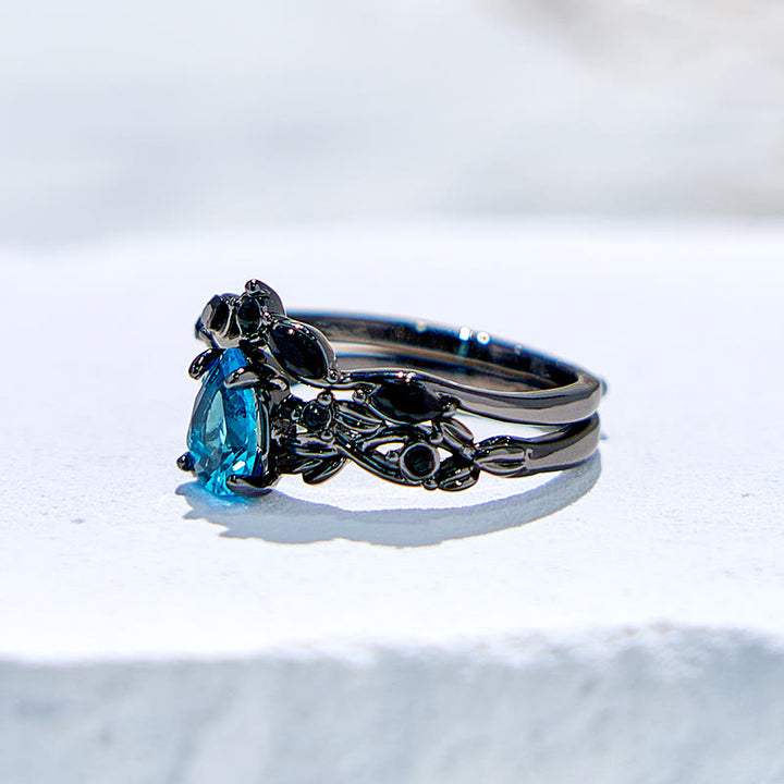 Juego de anillos de compromiso con hoja de aguamarina y piedra de la suerte de Olivenorma