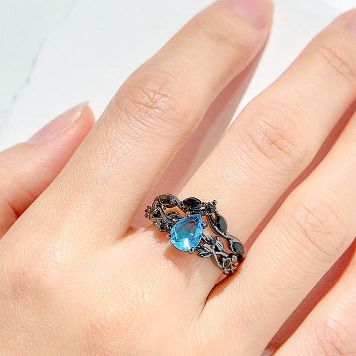 Juego de anillos de compromiso con hoja de aguamarina y piedra de la suerte de Olivenorma