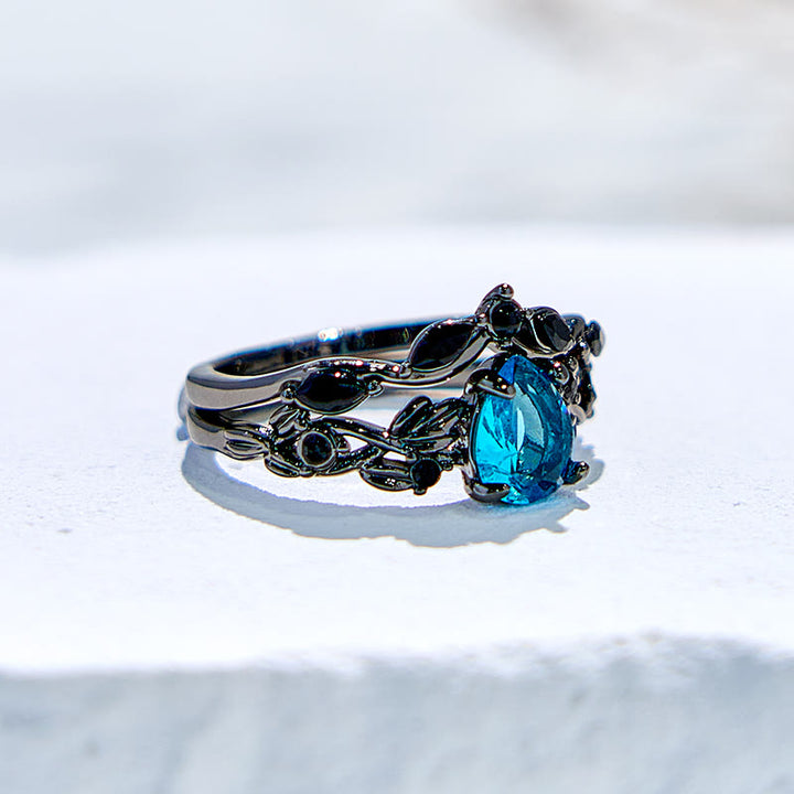 Juego de anillos de compromiso con hoja de aguamarina y piedra de la suerte de Olivenorma