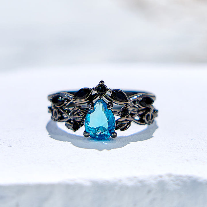 Juego de anillos de compromiso con hoja de aguamarina y piedra de la suerte de Olivenorma