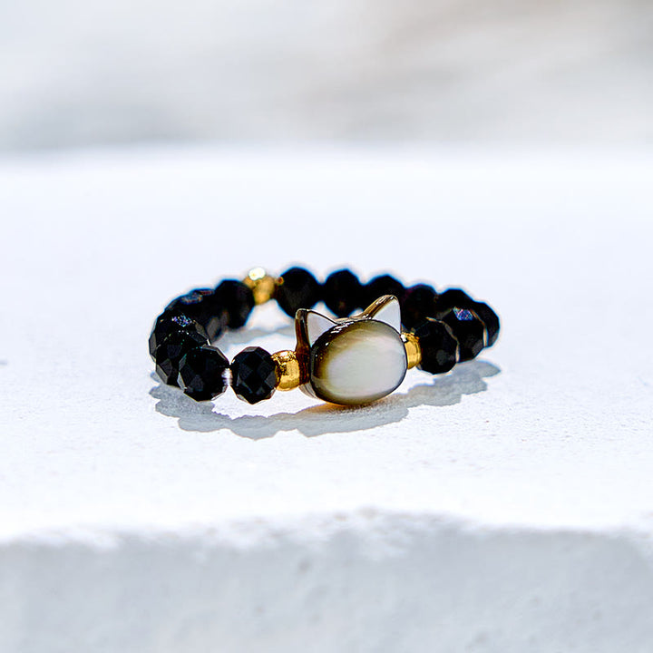 Anillo de cuentas de gatito de cristal transparente de obsidiana natural de Olivenorma