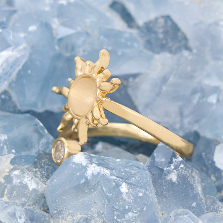 Anillo con efecto de sol y piedra de ojo de gato de ópalo rosa de Olivenorma