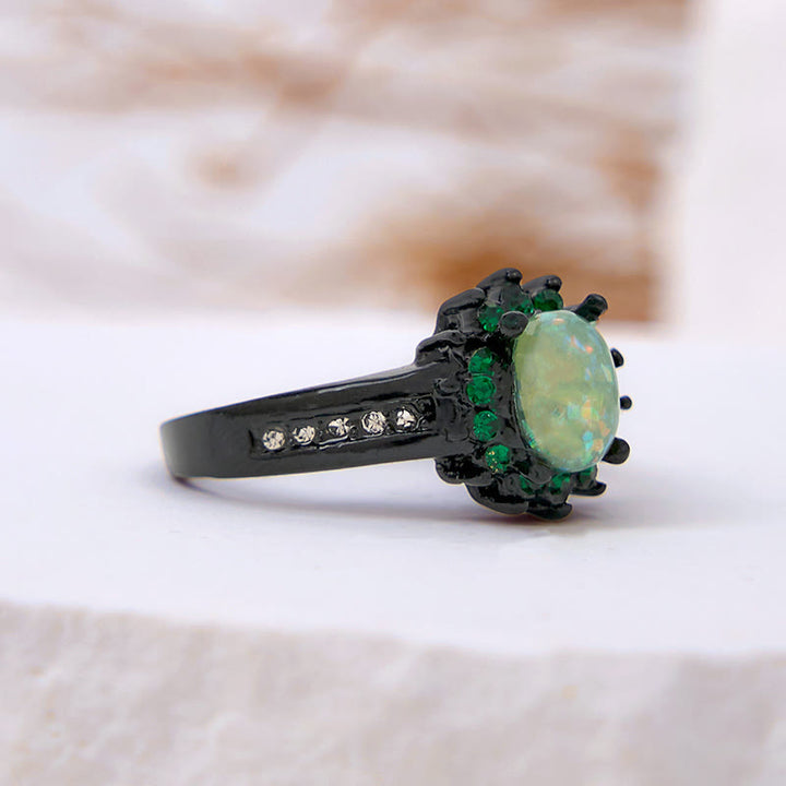 Anillo de girasol con circonita blanca y ópalo ovalado de Olivenorma