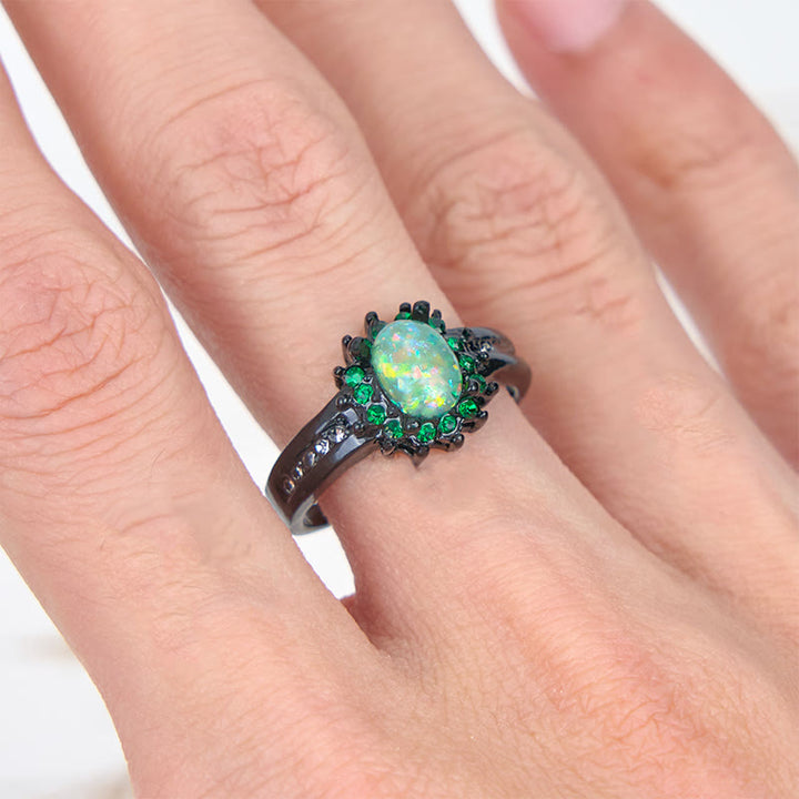 Anillo de girasol con circonita blanca y ópalo ovalado de Olivenorma