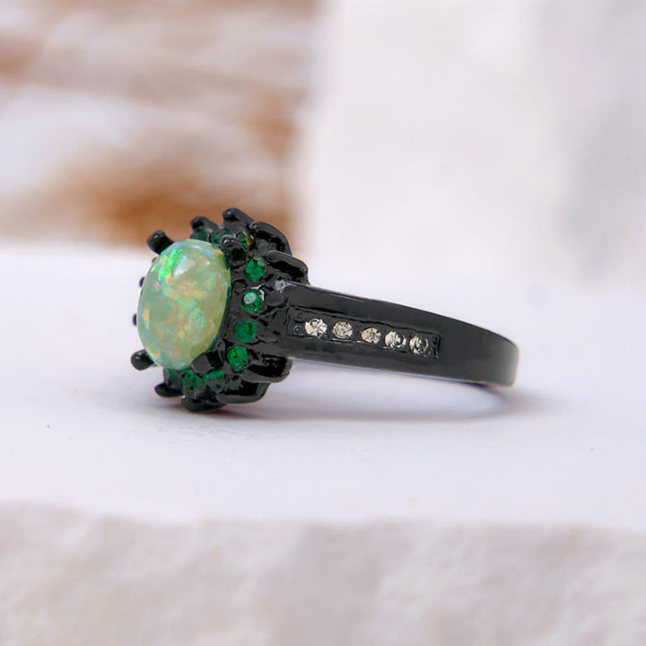 Anillo de girasol con circonita blanca y ópalo ovalado de Olivenorma