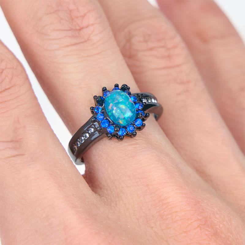 Anillo de girasol con circonita blanca y ópalo ovalado de Olivenorma