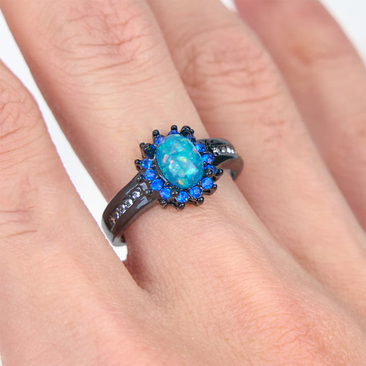 Anillo de girasol con circonita blanca y ópalo ovalado de Olivenorma