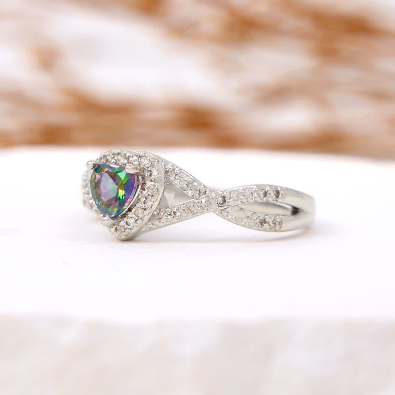 Anillo de alejandrita en forma de cruz infinita con forma de corazón de Olivenorma