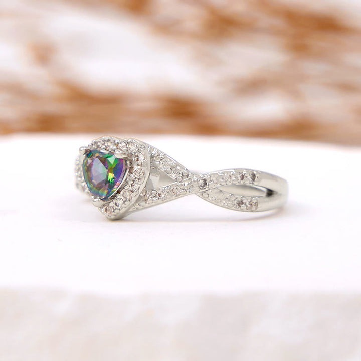 Anillo de alejandrita en forma de cruz infinita con forma de corazón de Olivenorma