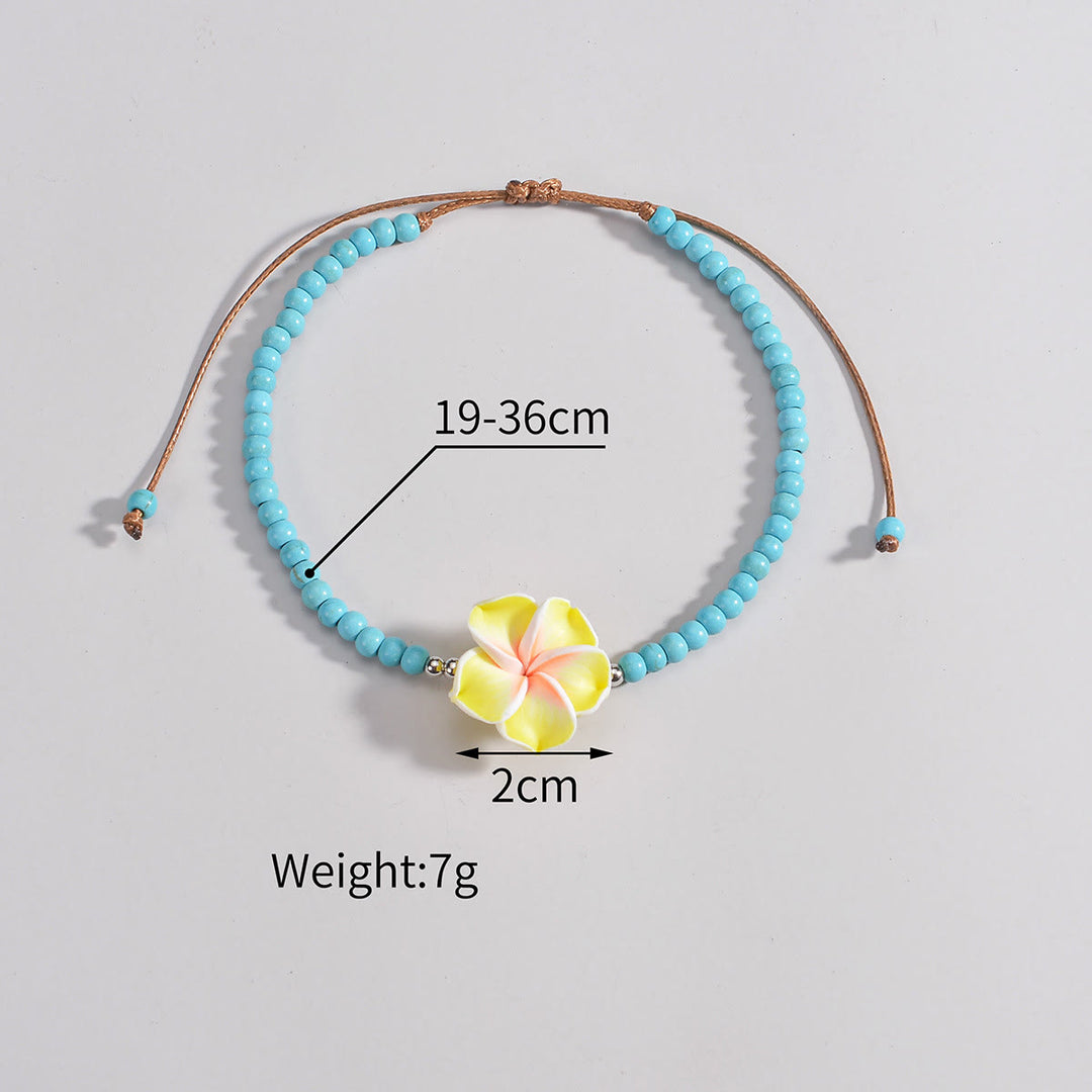 Tobillera con cuentas de plumeria y turquesa de Olivenorma