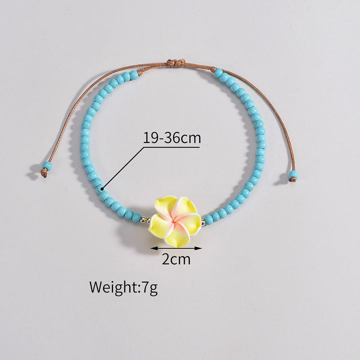 Tobillera con cuentas de plumeria y turquesa de Olivenorma
