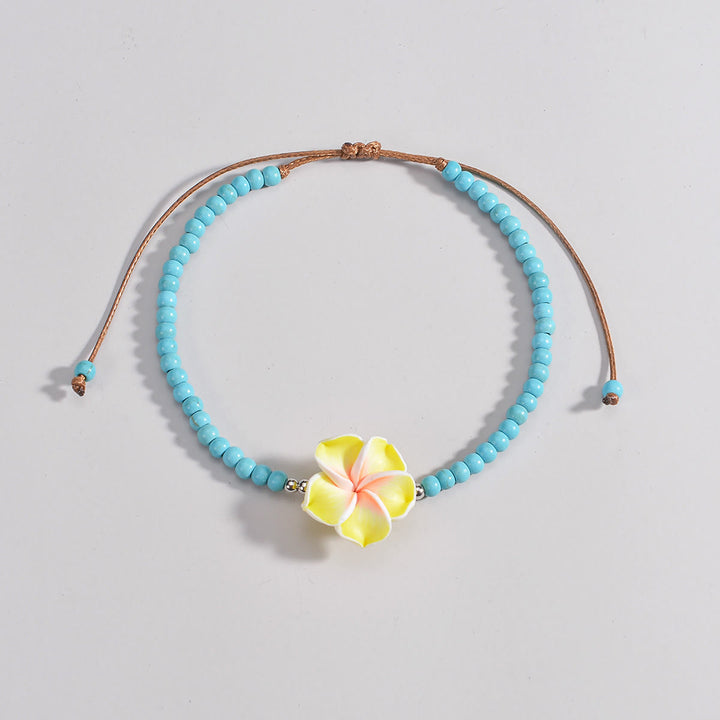 Tobillera con cuentas de plumeria y turquesa de Olivenorma