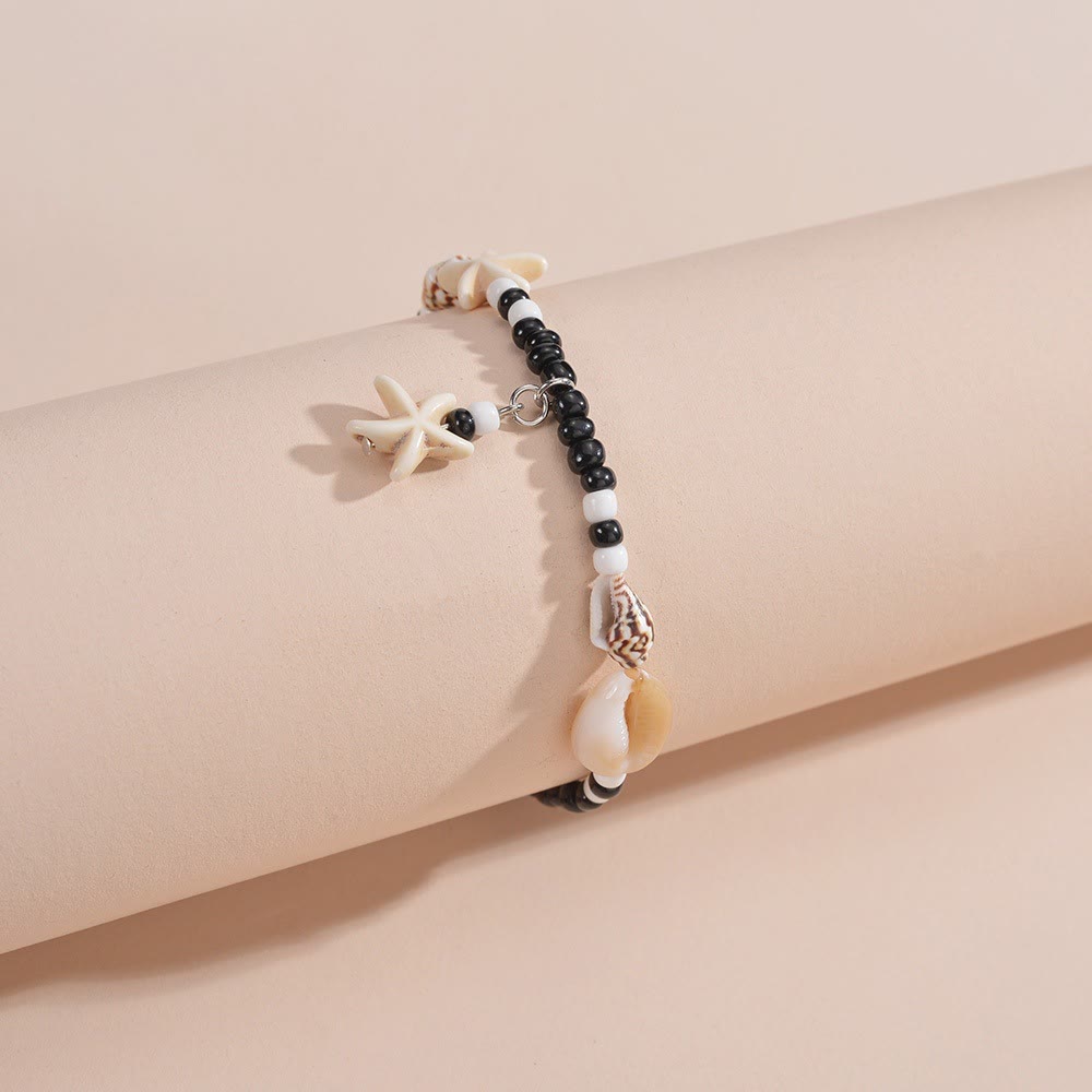 Tobillero con cuentas de caracol y estrella de mar de ónix negro y turquesa de Olivenorma