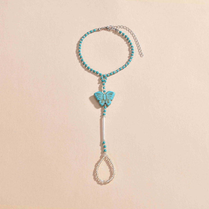 Tobillera con piercing de mariposa con cuentas turquesas de Olivenorma