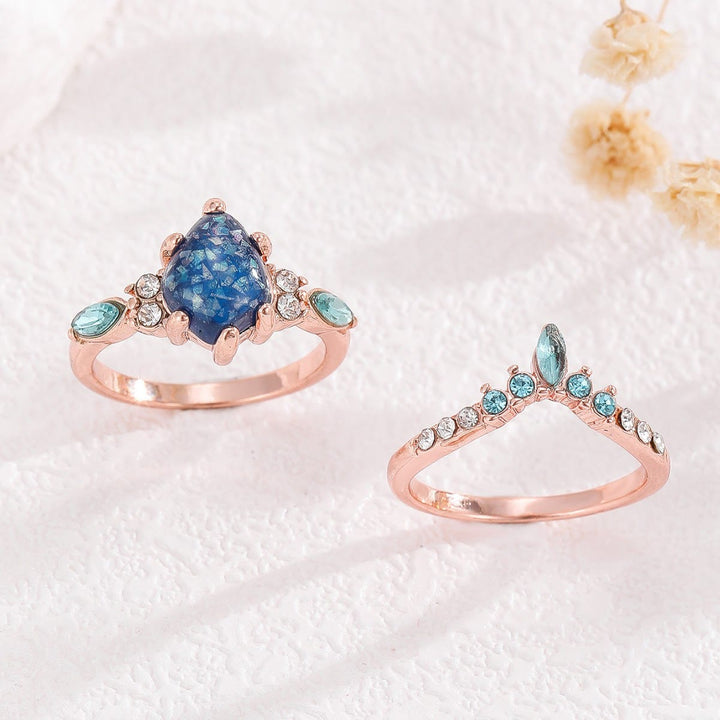 Anillo de corona de topacio azul y ópalo de 2 piezas de Olivenorma