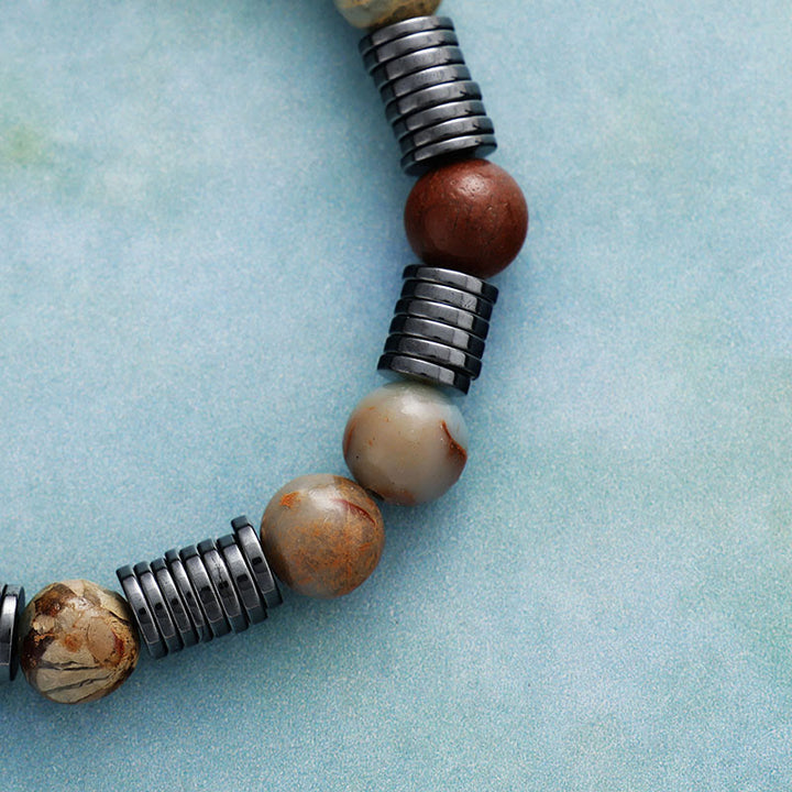 Pulsera de cuentas de agalmatolita, hematita y unakita de 8 mm de Olivenorma