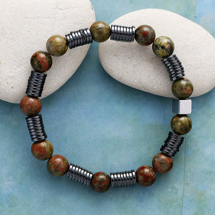 Pulsera de cuentas de agalmatolita, hematita y unakita de 8 mm de Olivenorma