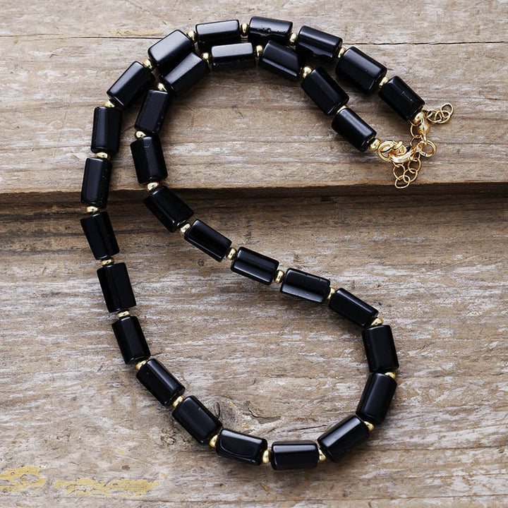 Collar de cuentas de ónix negro con chakras de corte prismático de Olivenorma