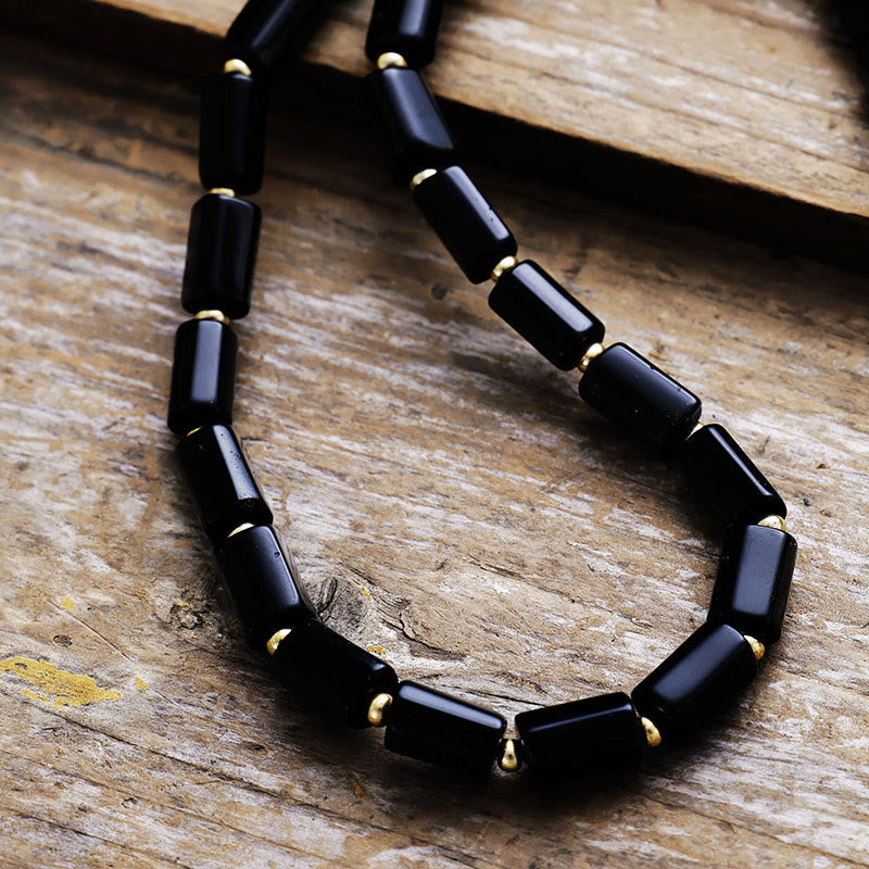 Collar de cuentas de ónix negro con chakras de corte prismático de Olivenorma