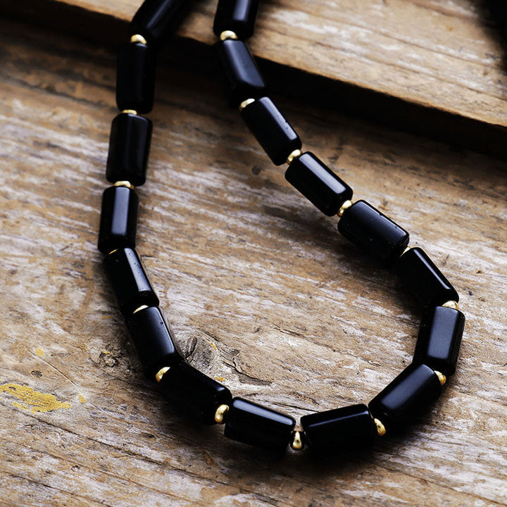 Collar de cuentas de ónix negro con chakras de corte prismático de Olivenorma