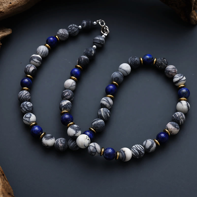 Collar de cuentas de piedra de seda negra con lapislázuli de Olivenorma
