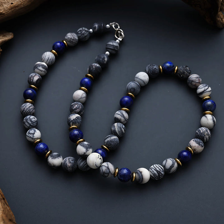 Collar de cuentas de piedra de seda negra con lapislázuli de Olivenorma