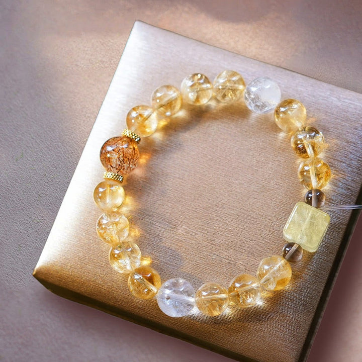 Pulsera de cuentas de citrino y cuarzo rutilado dorado de Olivenorma