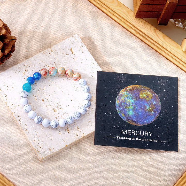 Pulsera de cristal con ocho planetas del sistema solar de Olivenorma con tarjeta