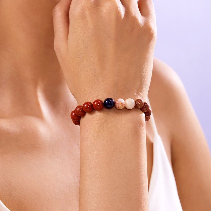 Pulsera de cristal con ocho planetas del sistema solar de Olivenorma con tarjeta