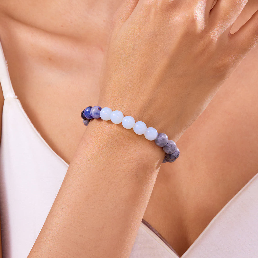 Pulsera de cristal con ocho planetas del sistema solar de Olivenorma con tarjeta