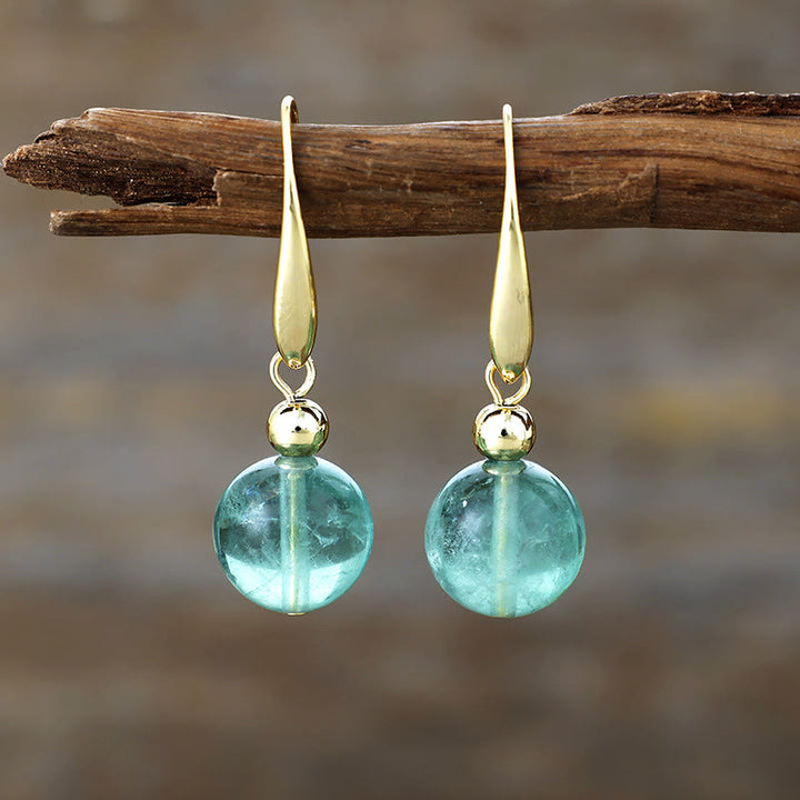 Pendientes colgantes de bola de cristal natural de Olivenorma