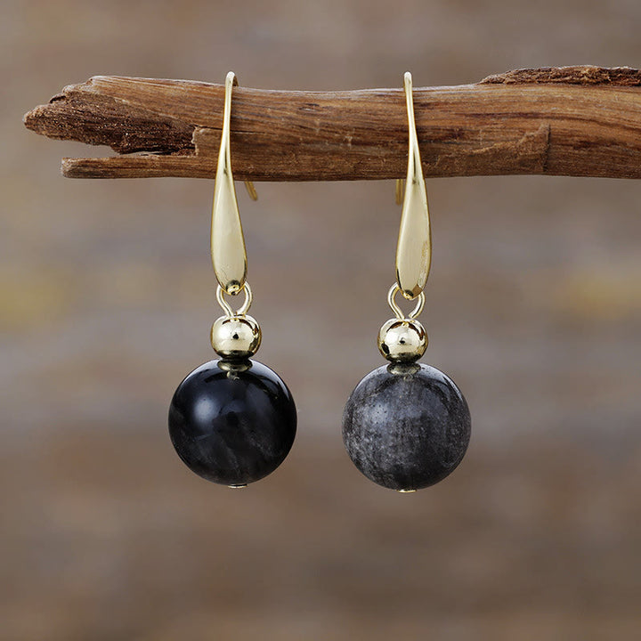 Pendientes colgantes de bola de cristal natural de Olivenorma