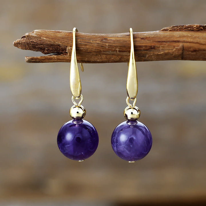 Pendientes colgantes de bola de cristal natural de Olivenorma