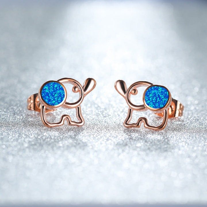 Pendientes con forma de elefante y ópalo azul y blanco de Olivenorma