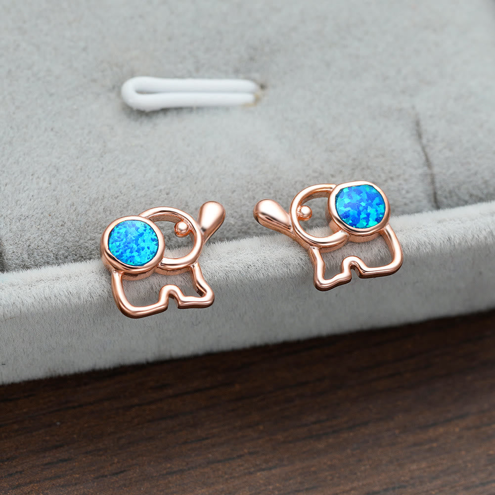 Pendientes con forma de elefante y ópalo azul y blanco de Olivenorma