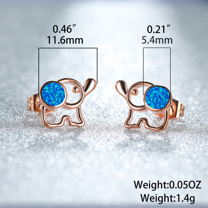 Pendientes con forma de elefante y ópalo azul y blanco de Olivenorma