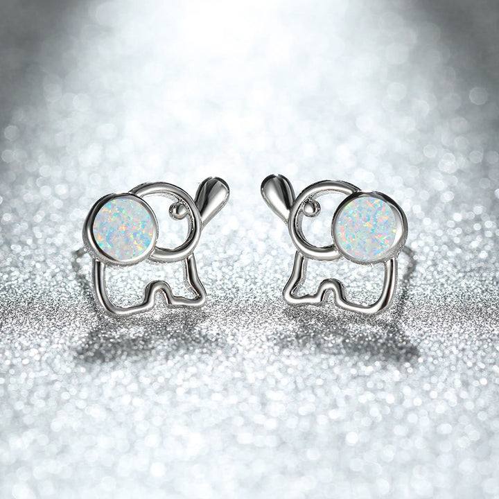Pendientes con forma de elefante y ópalo azul y blanco de Olivenorma
