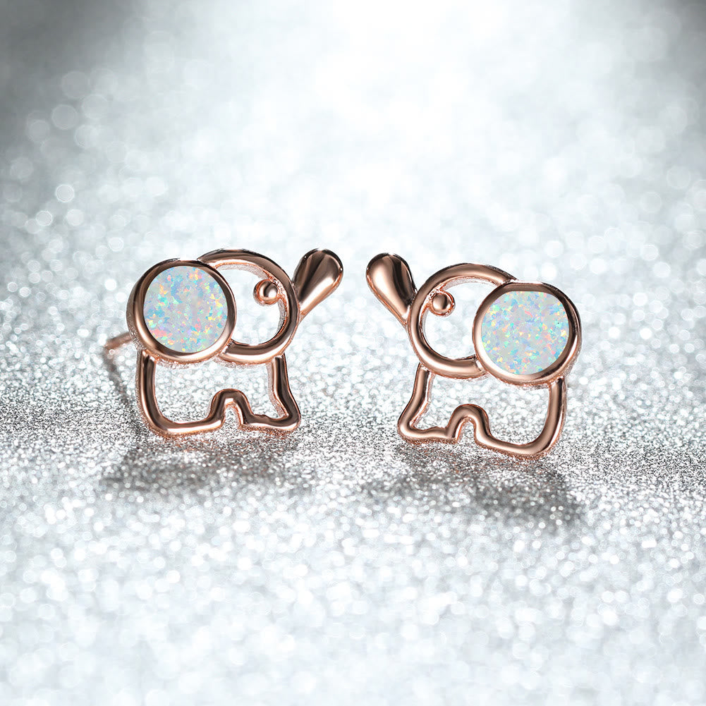 Pendientes con forma de elefante y ópalo azul y blanco de Olivenorma