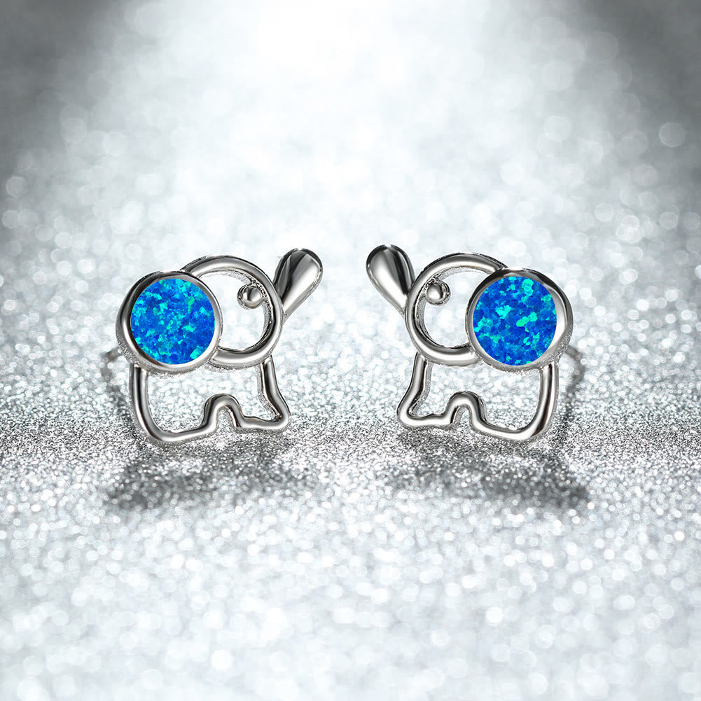 Pendientes con forma de elefante y ópalo azul y blanco de Olivenorma