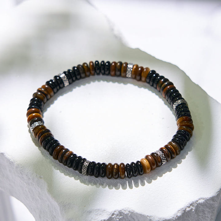 Pulsera de cuentas de ojo de tigre y ónix negro de Olivenorma