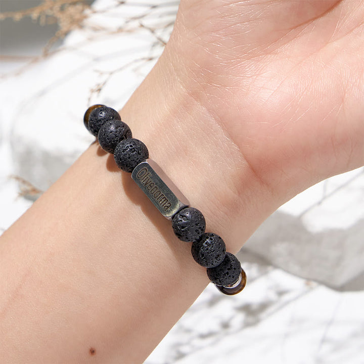Pulsera grabada con cuentas de piedra natural de Olivenorma