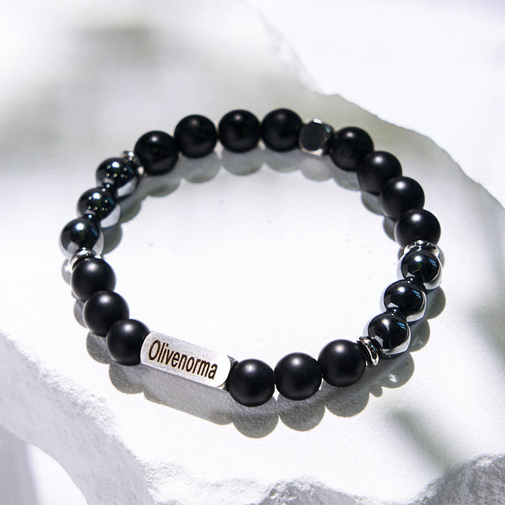 Pulsera grabada con cuentas de piedra natural de Olivenorma